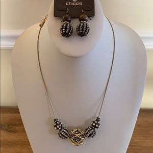 Beautiful gold colored necklace and earrings